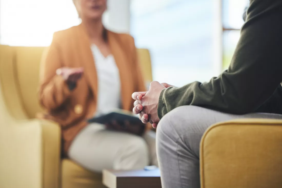 man-hands-listening-therapy-sofa-advice-from-woman-mental-health-psychology-care-psychiatrist-patient-frustrated-clinic-session-couch-help-anxiety-depression